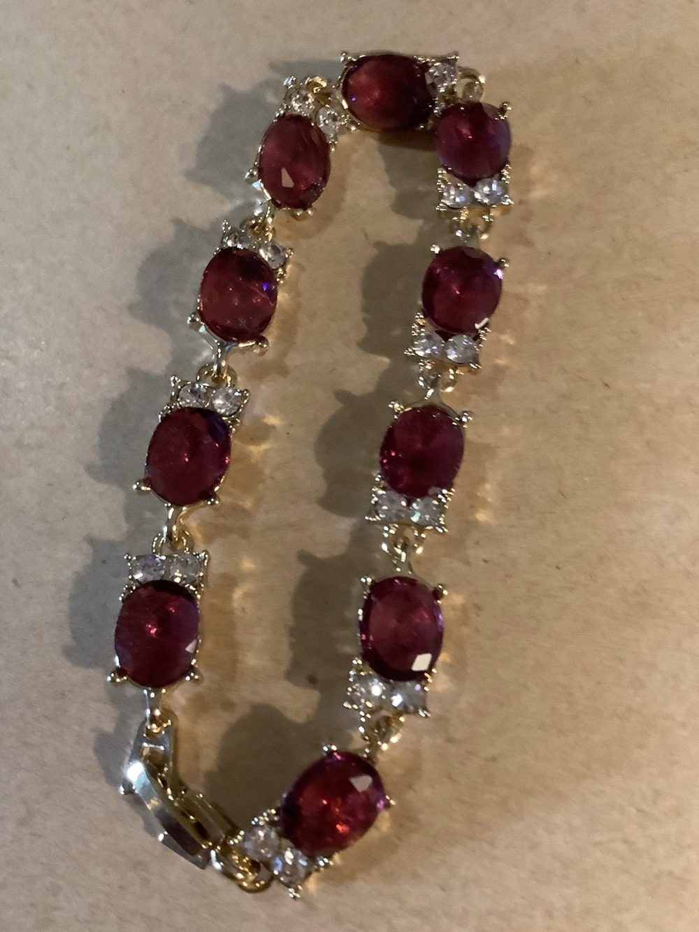 Ruby Crystal Stones Set in Gold Tone Bracelet